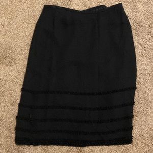 Black Escalade skirt with small ruffle trim